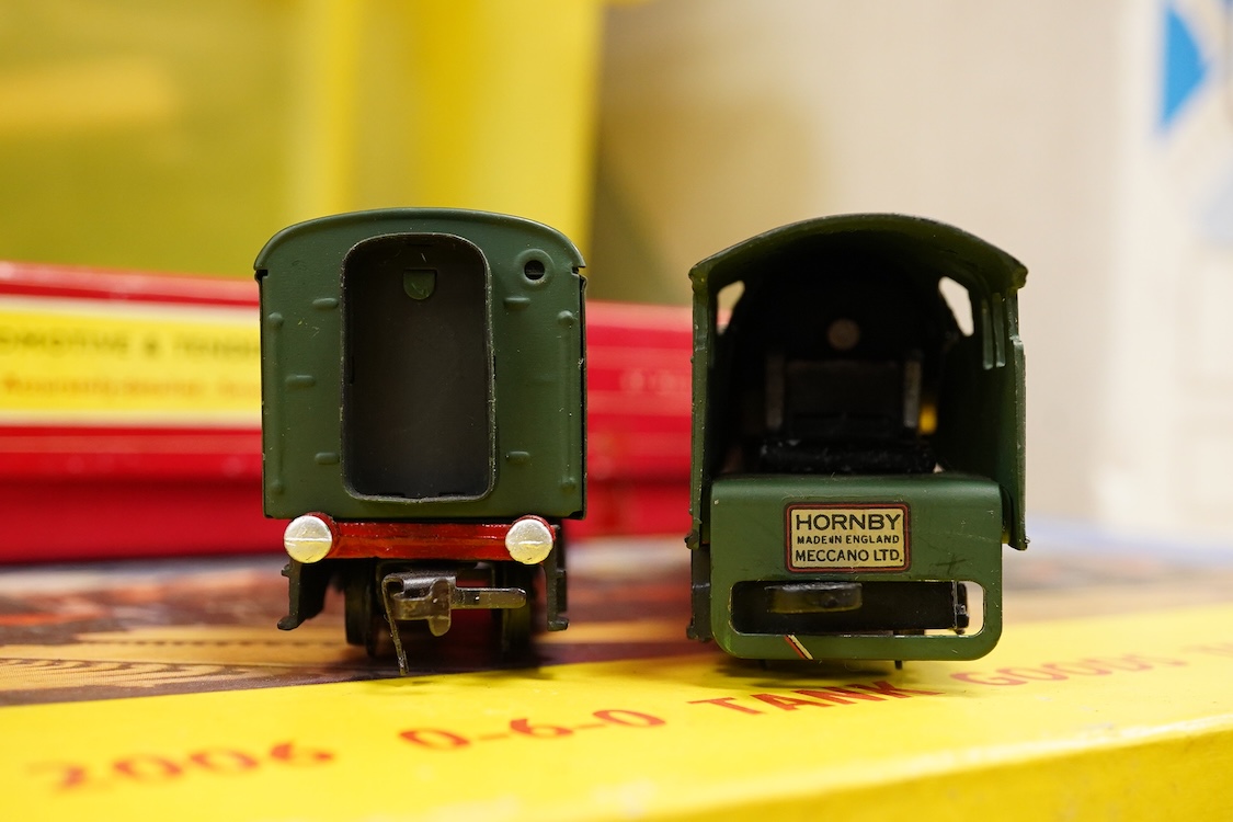 A collection of Hornby Dublo for 2 rail running, including; a boxed BR class A4 4-6-2, Golden Fleece 60030, (2211), together with three boxed bogie coaches and two wagons, plus four unboxed wagons, and a complete box set